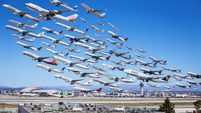 Multiple airplanes flying over Los Angeles International Airport