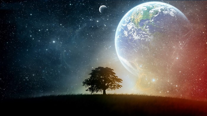 Earth and moon in starry sky over lone tree