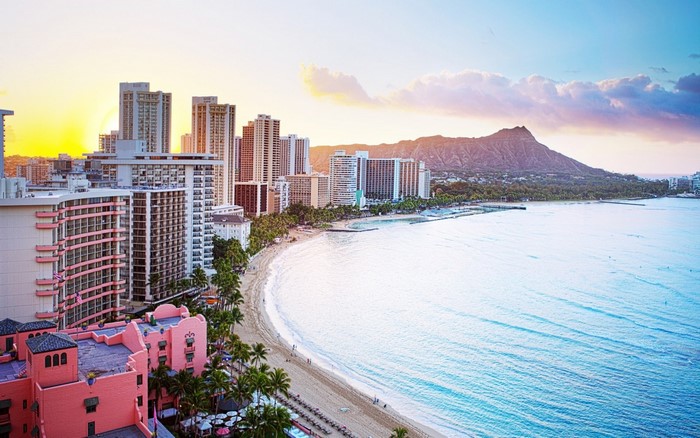 Waikiki Beach cityscape with Diamond Head at sunset