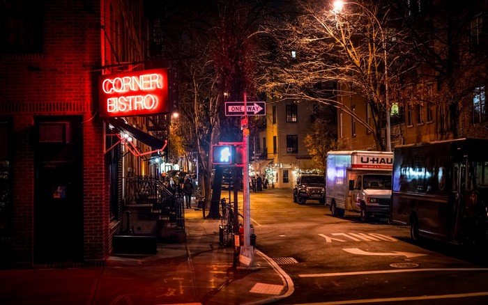 Corner Bistro at night in a city street