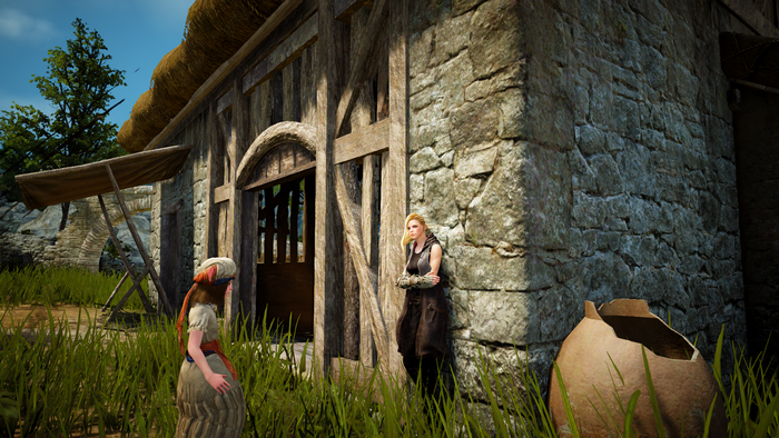 Two women outside a stone and wood building in Black Desert