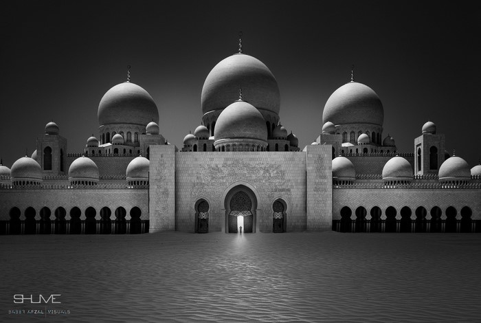 Sheikh Zayed Grand Mosque in Abu Dhabi, monochrome desert landscape