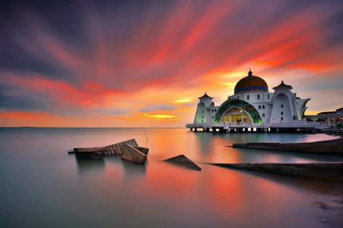 Strait Mosque at sunset over the sea