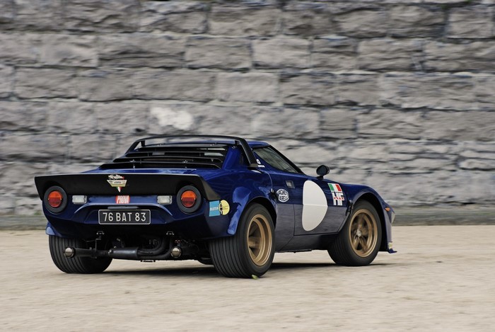 Blue Lancia Stratos rally car with racing decals