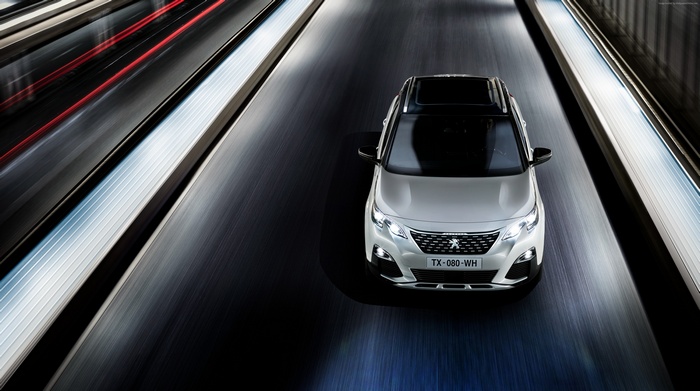 Peugeot 3008 GT Line Crossover driving on a road