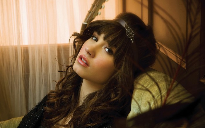 Demi Lovato posing for a portrait