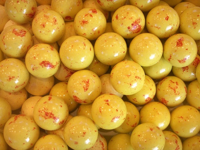 Yellow balls with red speckles