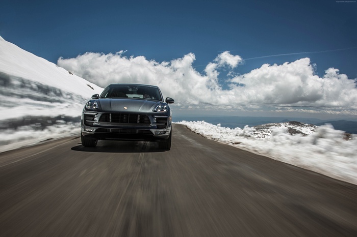 Porsche Macan GTS on a snowy mountain road