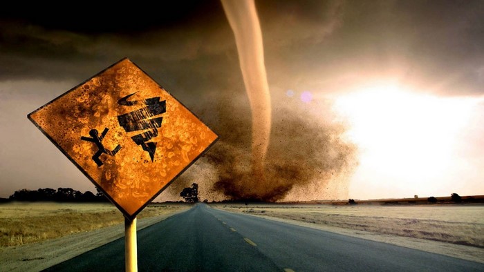 Tornado warning sign on a road