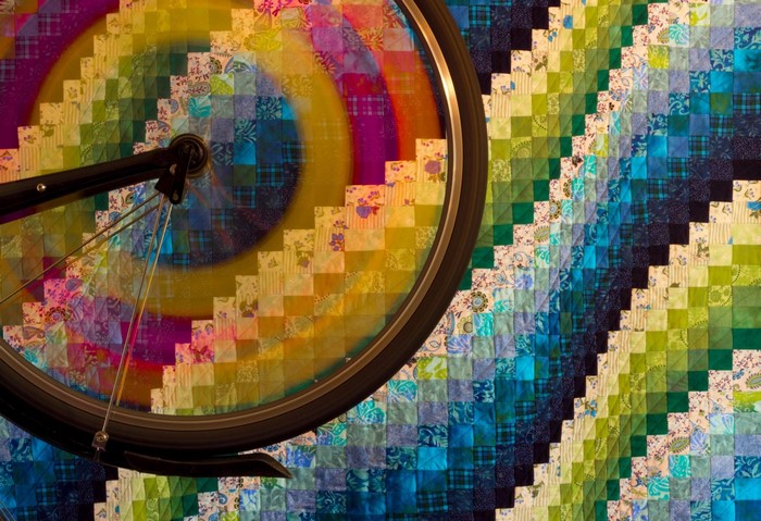 Abstract colorful bicycle wheel and quilt pattern