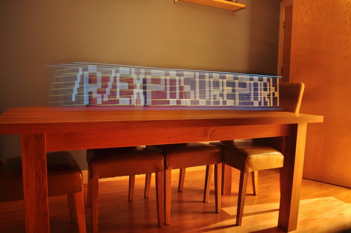 Wooden dining table with chairs and light streaks