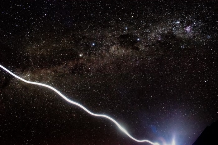 Milky Way galaxy with a light streak