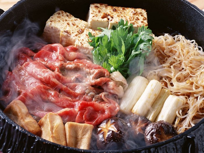 Japanese Sukiyaki Hot Pot with Beef, Tofu, and Vegetables