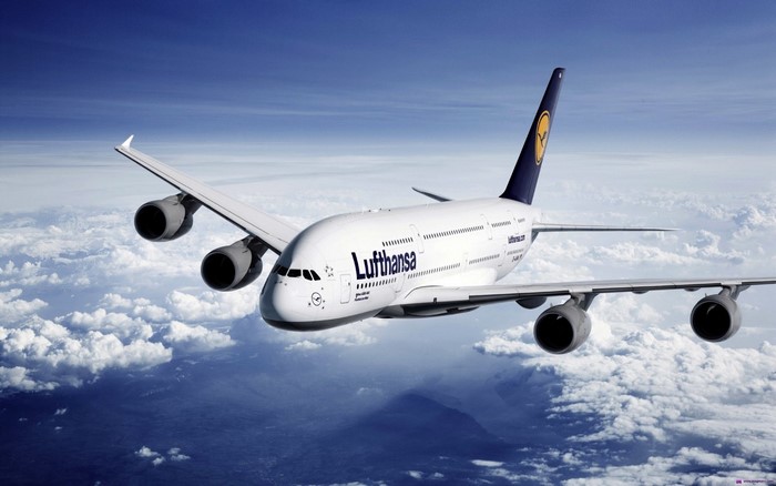 Lufthansa Airbus A380 in Flight Above Clouds