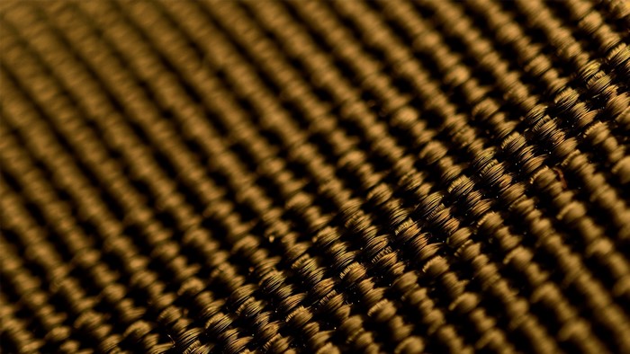 Close-up of woven brown fabric texture