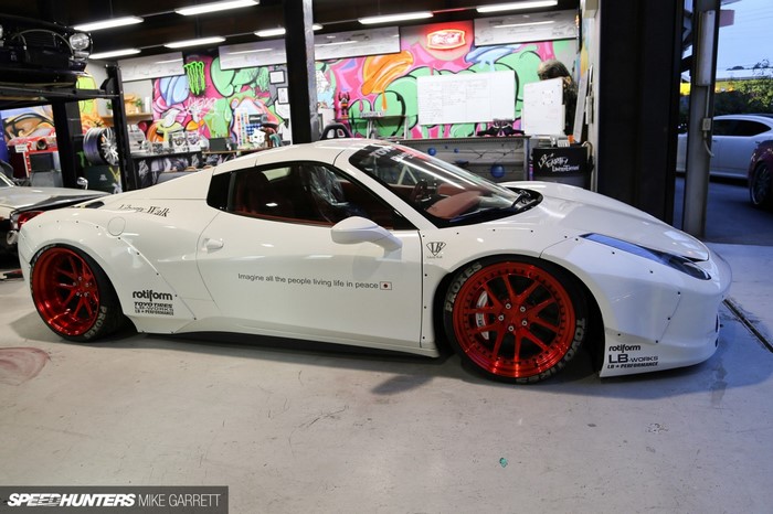 White Ferrari 458 Italia with Liberty Walk body kit and red wheels
