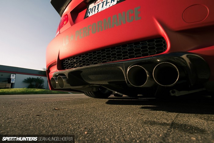 Red BMW E92 M3 LB Performance with quad exhaust