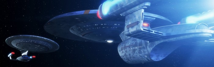 Two Starfleet starships in space