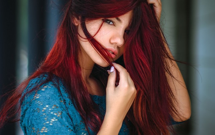 Portrait of Woman with Long Red Hair