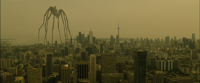 Giant spider-like creature over Toronto cityscape