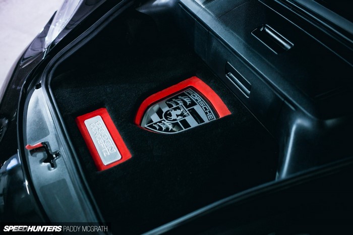 Porsche crest and logo in car trunk