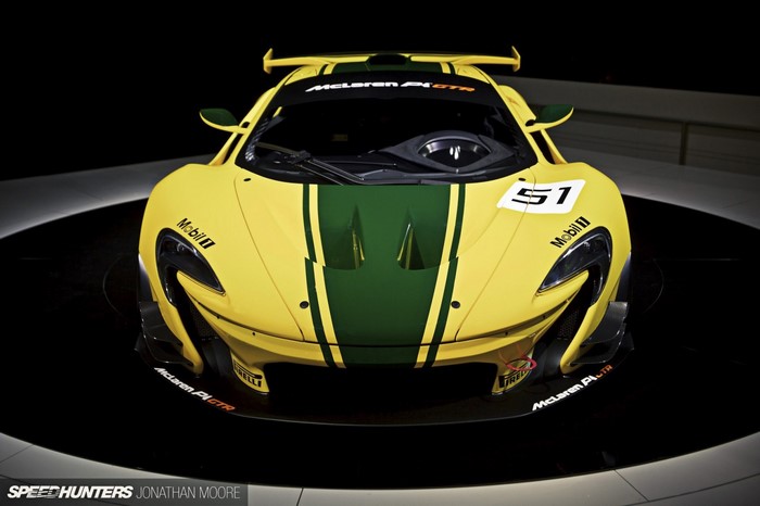 Yellow McLaren P1 GTR race car with green stripes