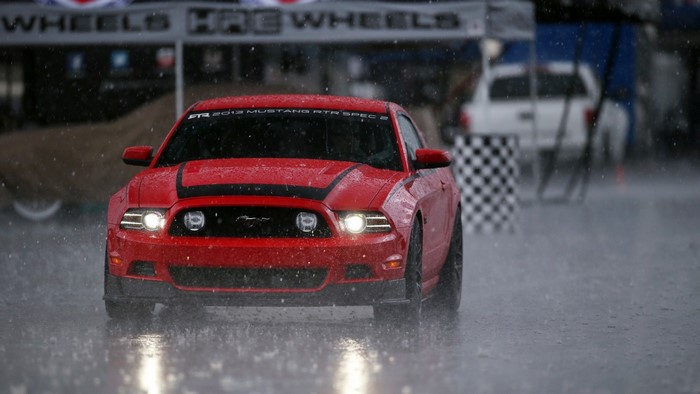 Red 2013 Mustang RTR Spec 2 in the rain