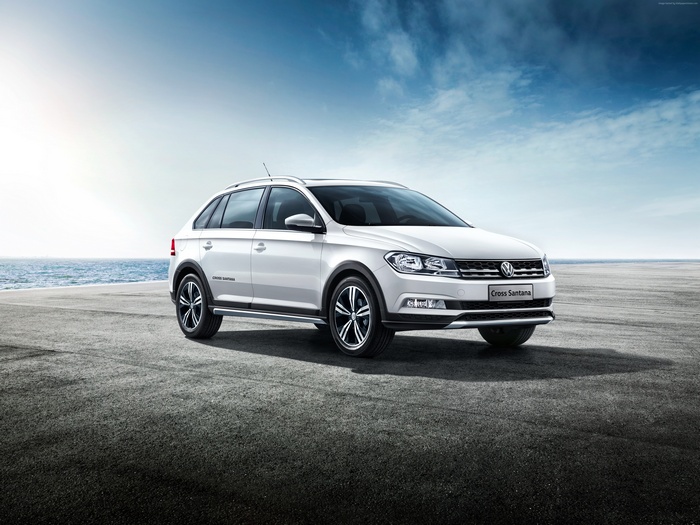White Volkswagen Cross Santana Estate by the Sea