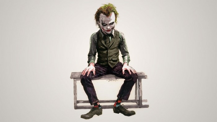 Joker from The Dark Knight sitting on a bench