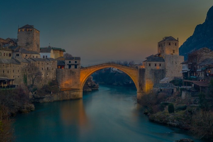 Stari Most bridge over Neretva River at dusk