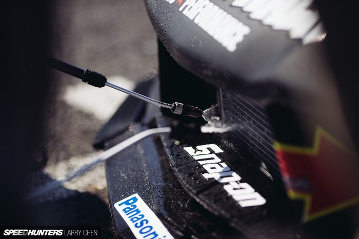 Close-up of a race car's engine bay with Snap-on and Panasonic logos