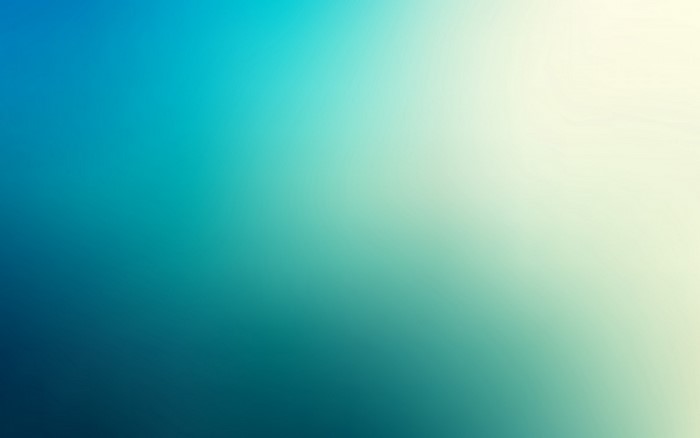 Blue and green gradient with light flare