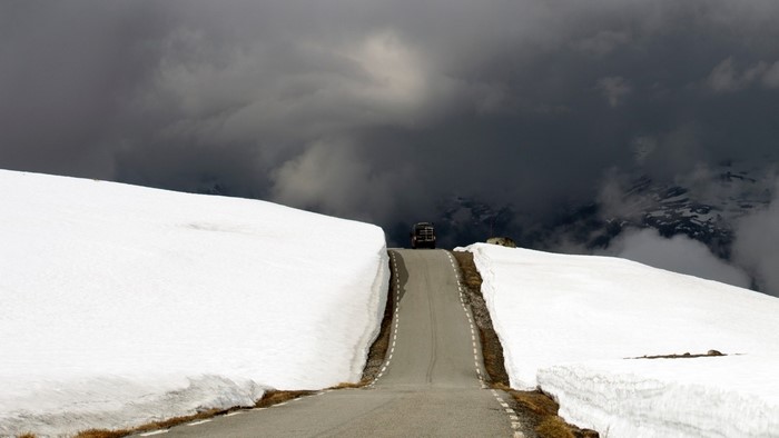 Truck on a snowy mountain road in Norway