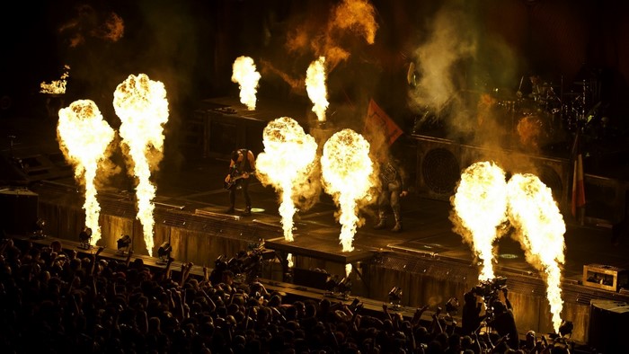 Rammstein concert with fire effects and audience