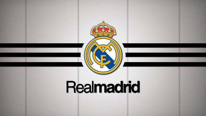 Real Madrid logo and text on a striped background
