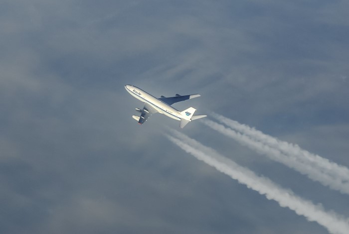 Korean Air IL-86 Aircraft Flying with Contrails
