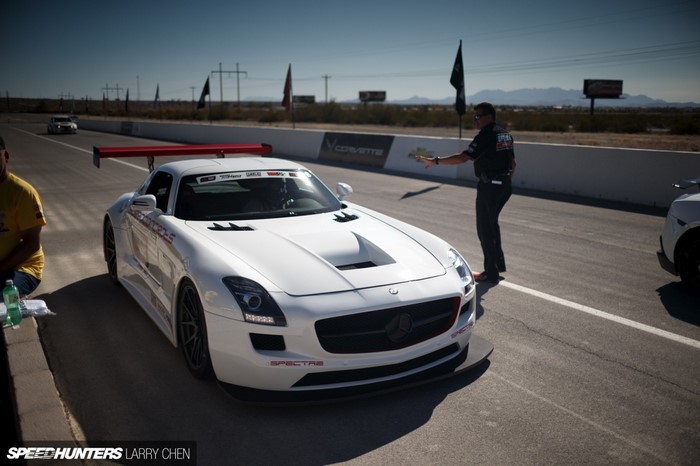 White Mercedes-Benz SLS AMG on a Race Track