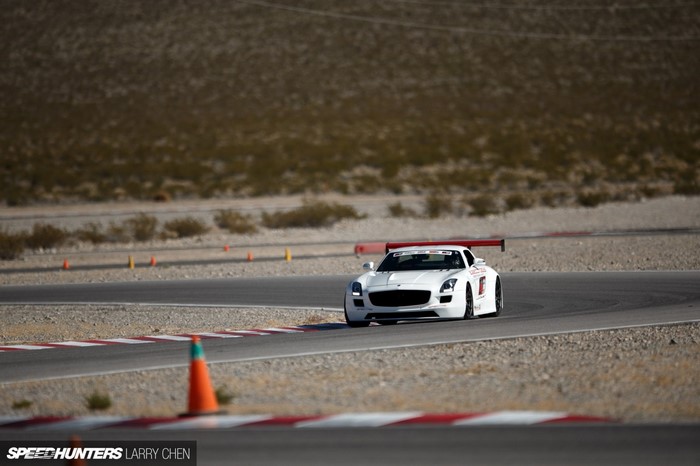 White Mercedes-Benz SLS AMG on a race track