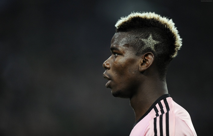 Paul Pogba with a star haircut
