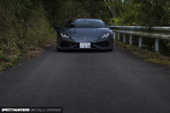 Dark Grey Lamborghini Huracan on a Forest Road