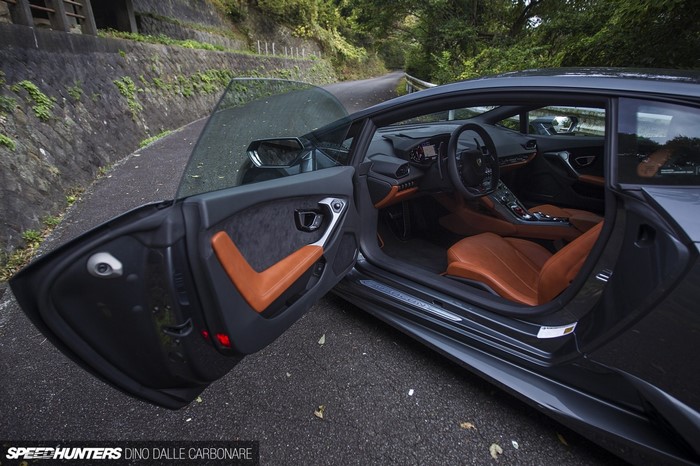 Lamborghini Huracan interior and exterior on a winding road