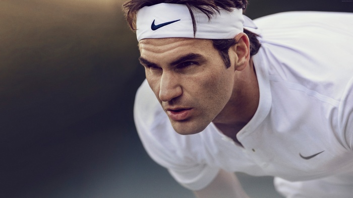 Roger Federer wearing Nike headband and shirt