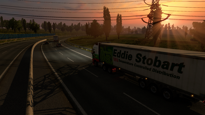 Eddie Stobart truck on highway at sunset