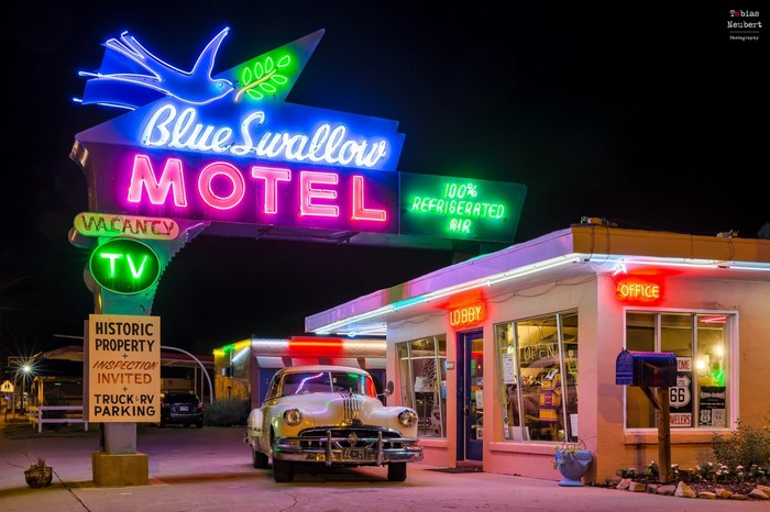 Blue Swallow Motel Neon Sign at Night
