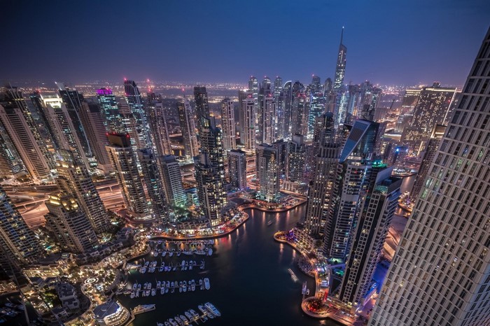 Dubai Marina skyscrapers at night aerial view
