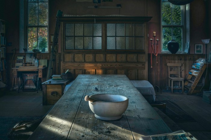 Interior of an old building with a wooden table