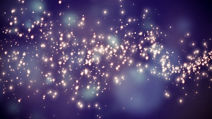 Sparkling lights and bokeh effect on a dark background