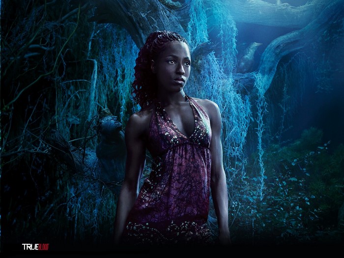 Tara Thornton from True Blood in a dark forest