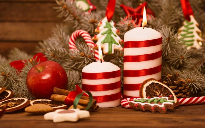 Christmas still life with candles and apple