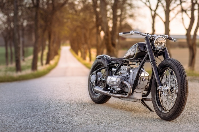 BMW Motorrad R 5 Hommage motorcycle on a tree-lined road